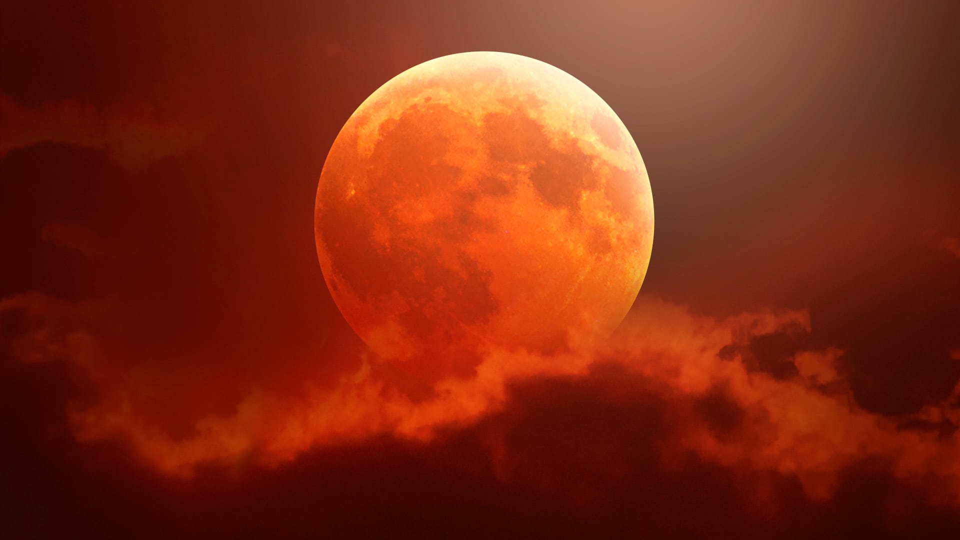 Big Blood Moon in clouds