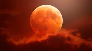 Big Blood Moon in clouds