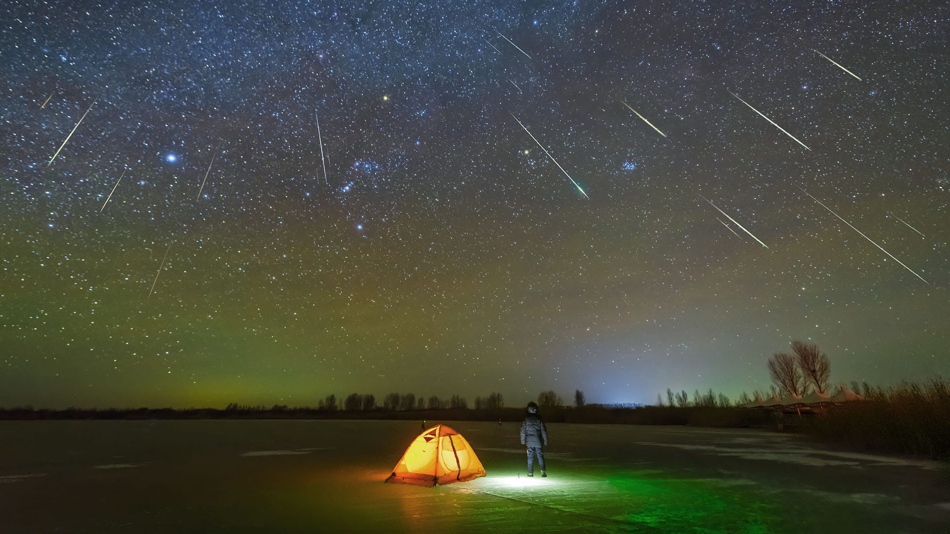 Man watching a meteor shower