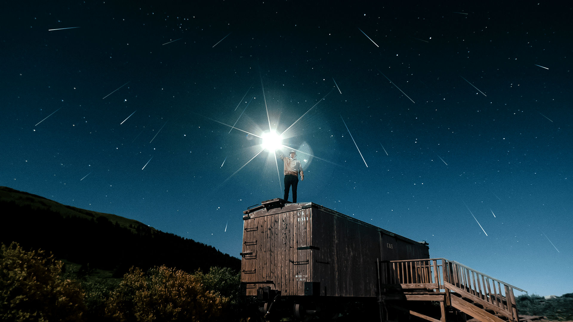 A man watching a meteor shower
